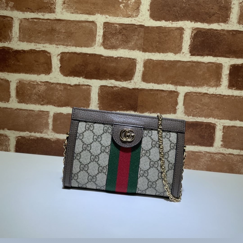 G*u*i clutch bags